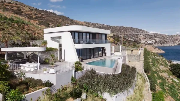 Villa exterior with pool and sea